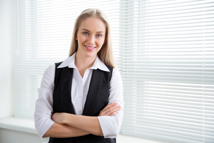 Portrait of a business woman against a window.