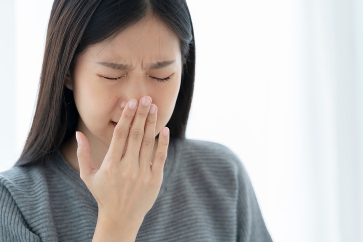 asian unhealthy woman feel cool with flu and cough all the time