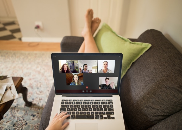 A POV photo of a group of people hanging out online on a video chat during a pandemic lockdown