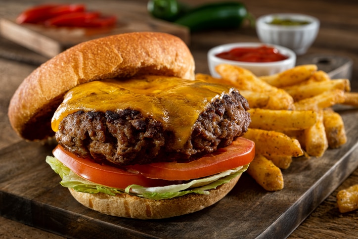 A delicious homemade burger with real cheddar cheese and black pepper seasoned french fries.