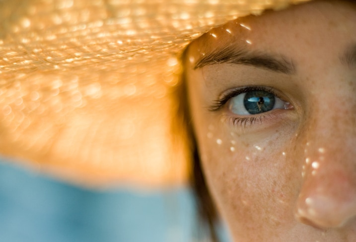 girl wearing a hat in summer