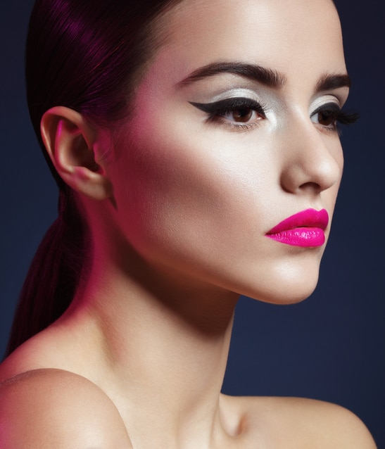 Studio close-up beauty portrait of sensual woman. Professional make-up. High-end retouch.